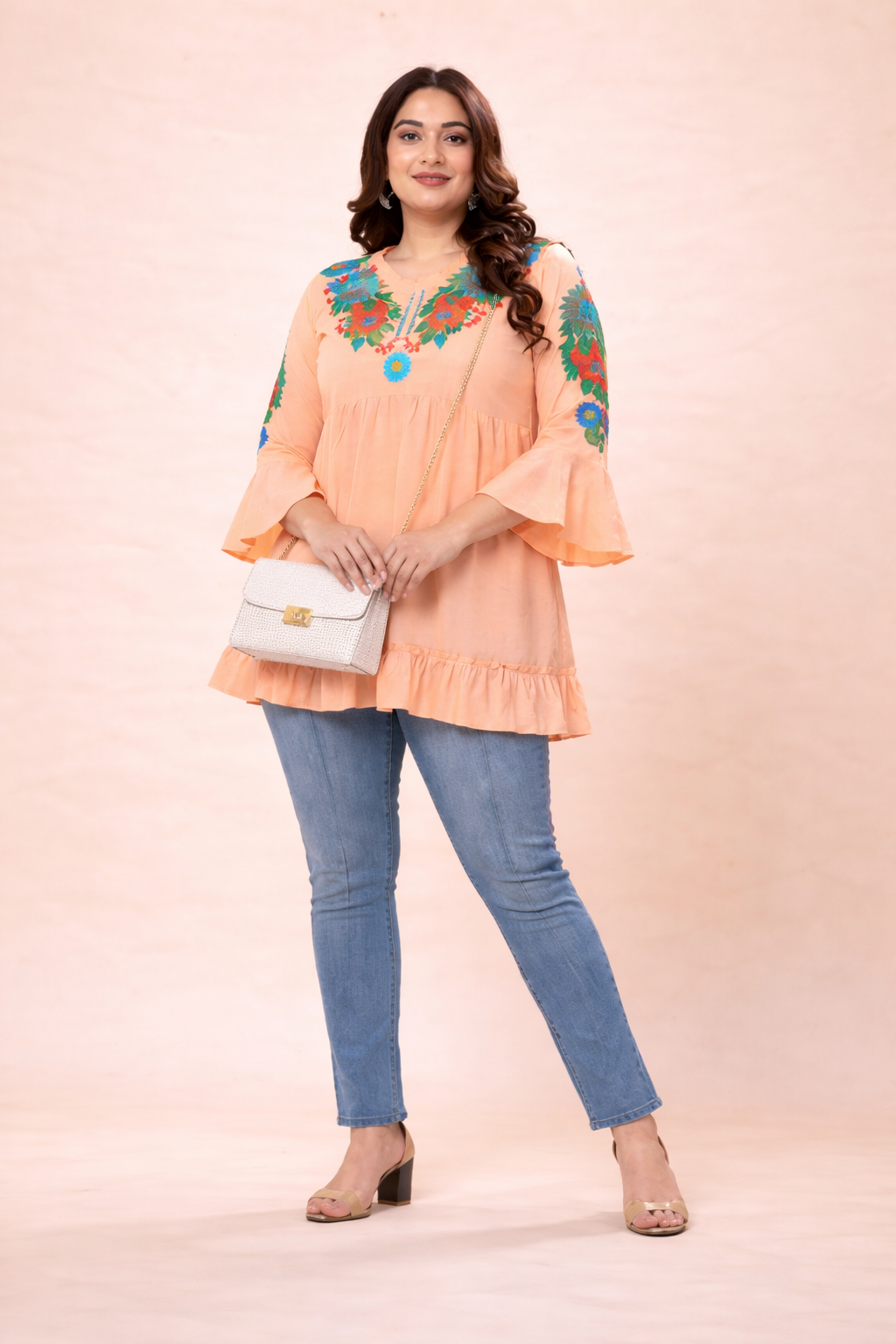 Peach Floral Embroidered Tiered Peplum Top | Vaamii